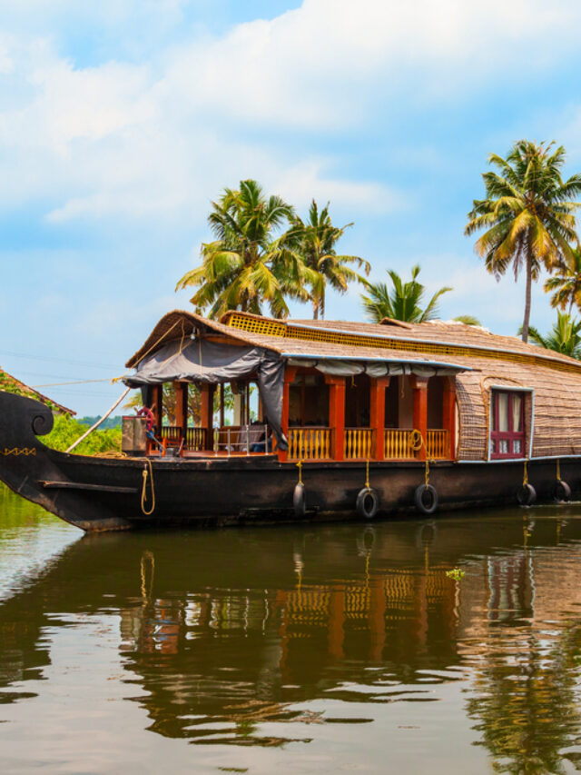 A houseboat sailing in Alappuzha backwaters in Kerala state in India